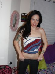 Milf Natalie Jo gets naked to give us a view of her hot tattooed body