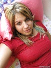 Thick blonde girl Roxy Blue taking self-shots while masturbating in bed
