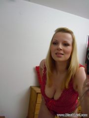 Busty blonde chick Ricky taking self shots in mirror while masturbating